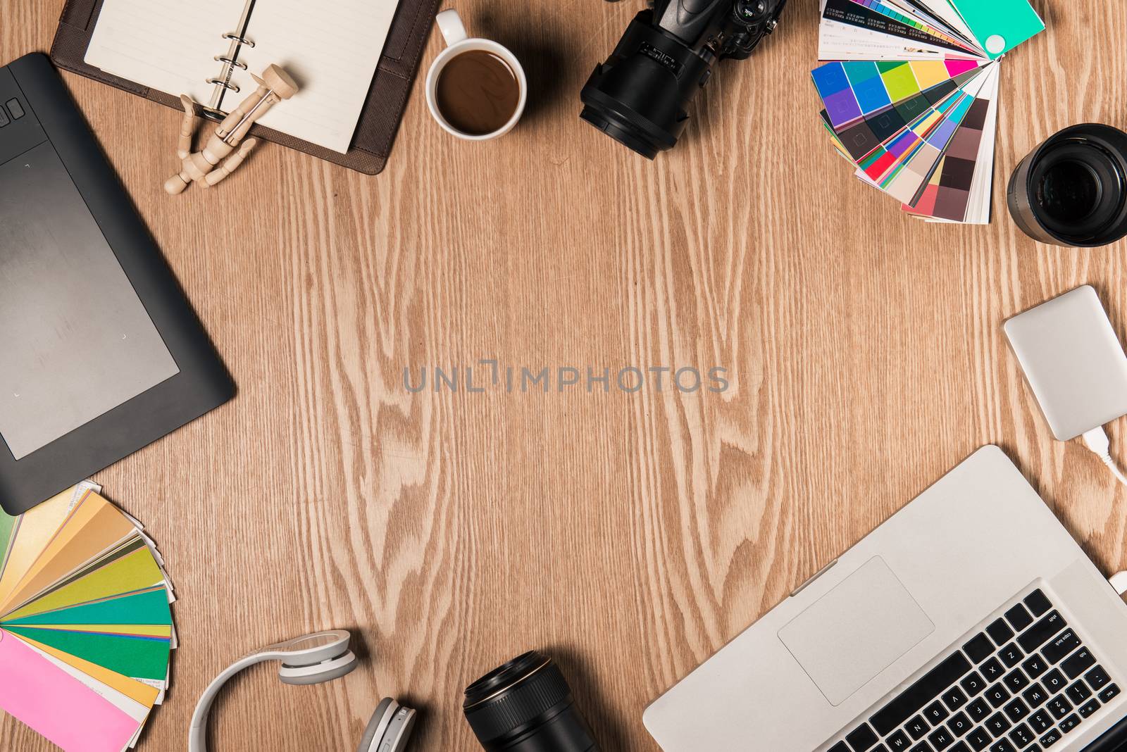 Top view of photographer at workplace with copy space by makidotvn