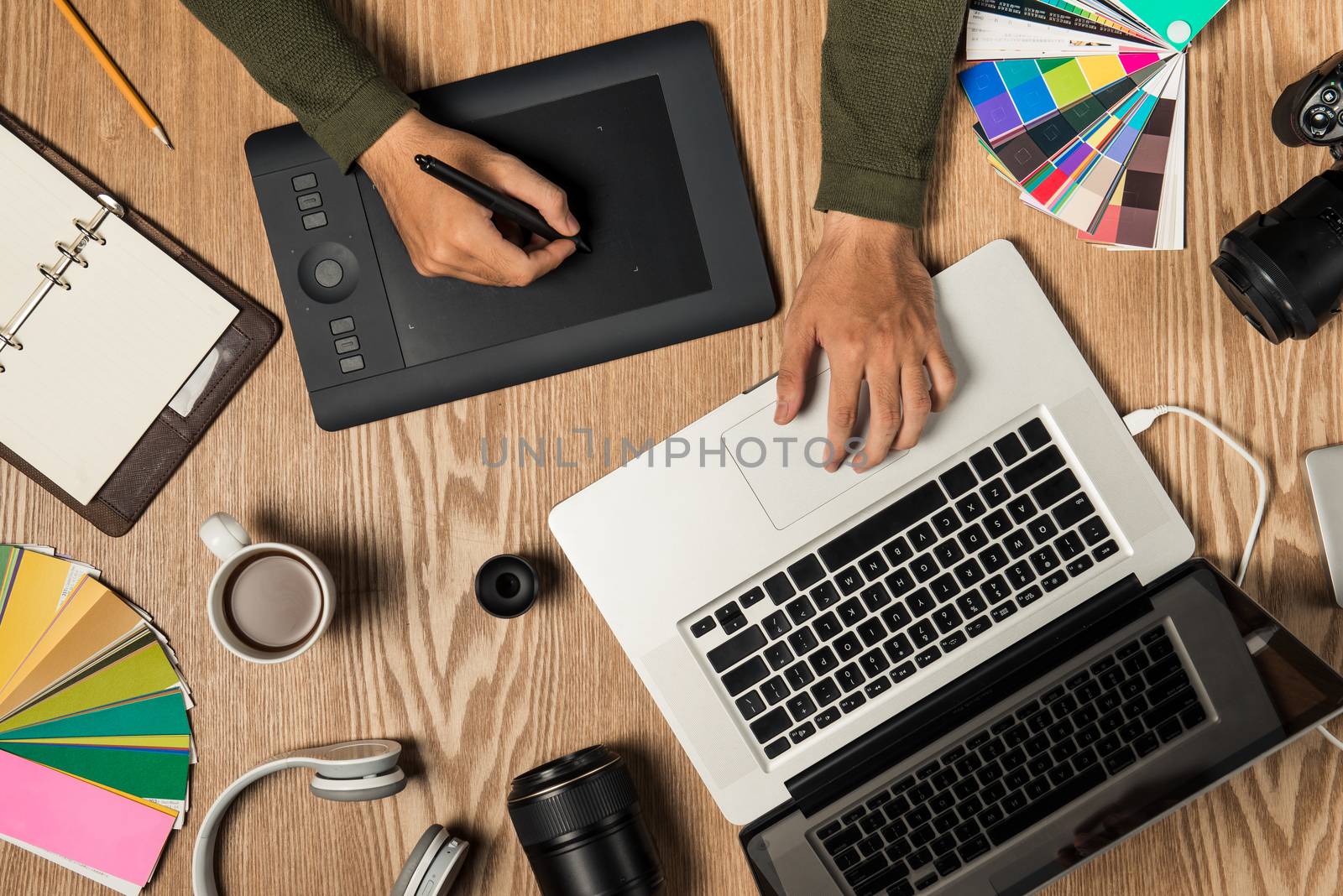 Top view of photographer at workplace with copy space