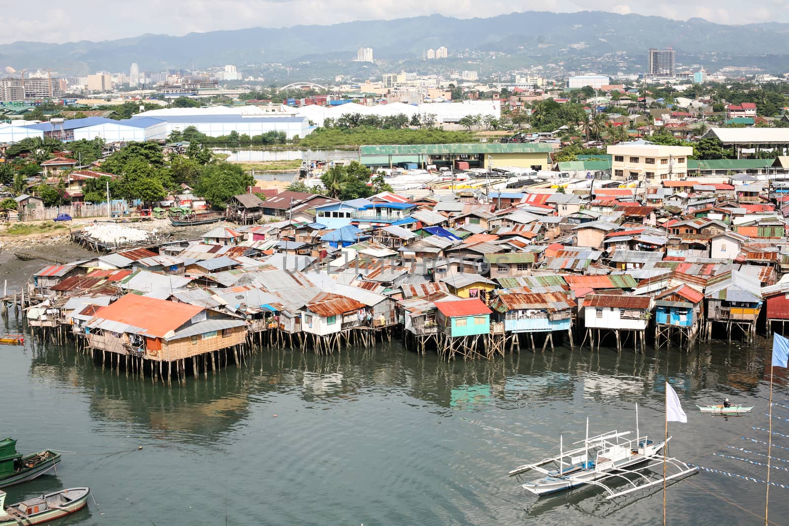 Everyday life of filipinos. Settlement on water in Cebu city Philippines