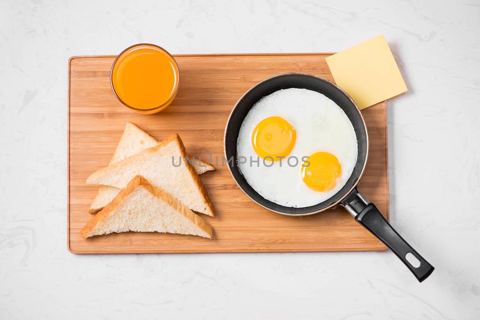 Traditional breakfast with fried eggs on a plate