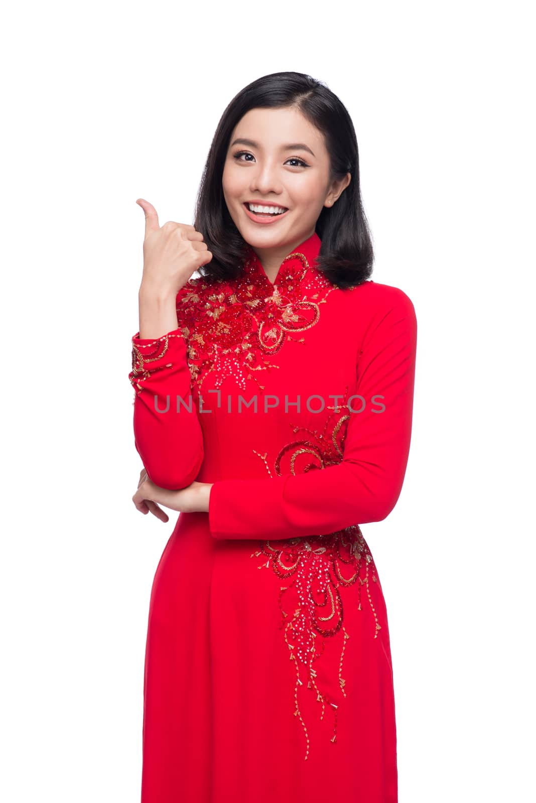 Charming Vietnamese Woman in Red Ao Dai Traditional Dress. gestu by makidotvn