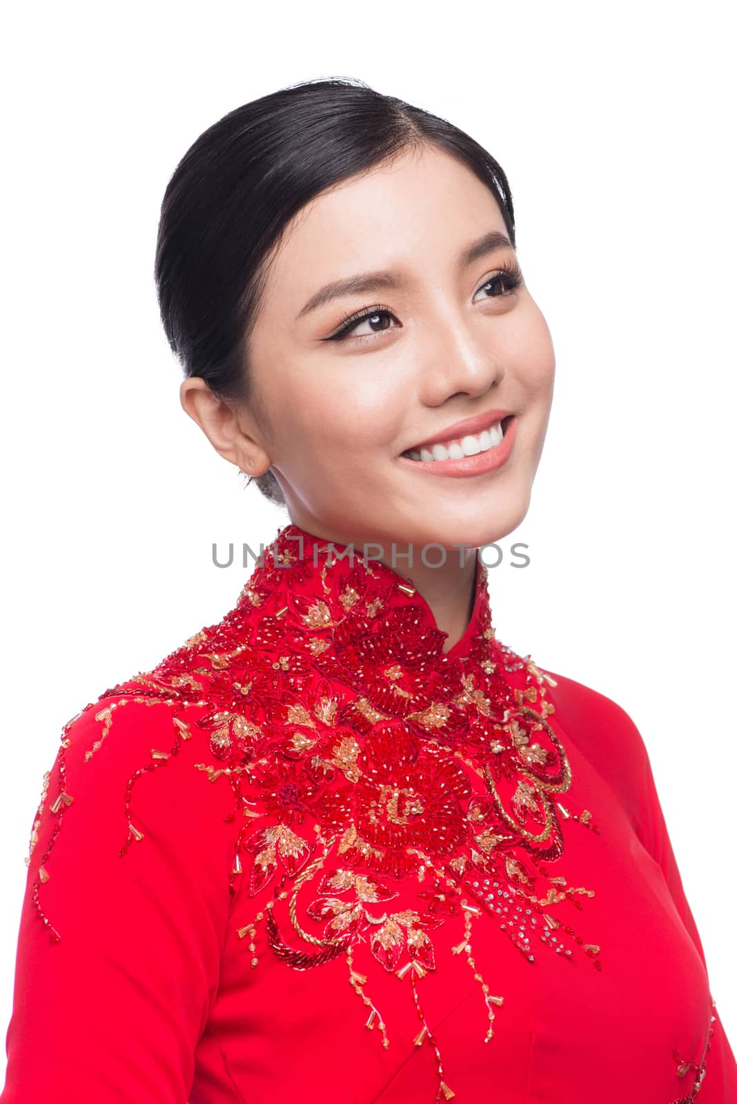 Charming Vietnamese Woman in Ao Dai Traditional Dress isolated on white.