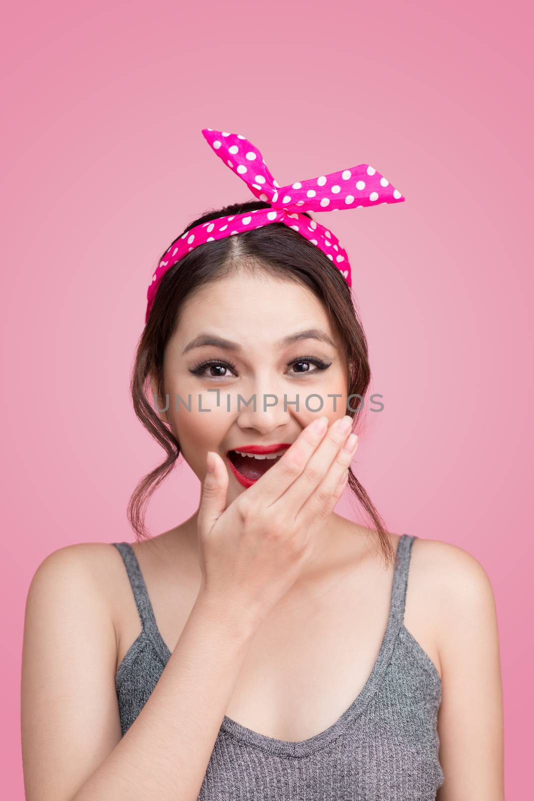 Surprised asian girl with pretty smile in pinup makeup style by makidotvn