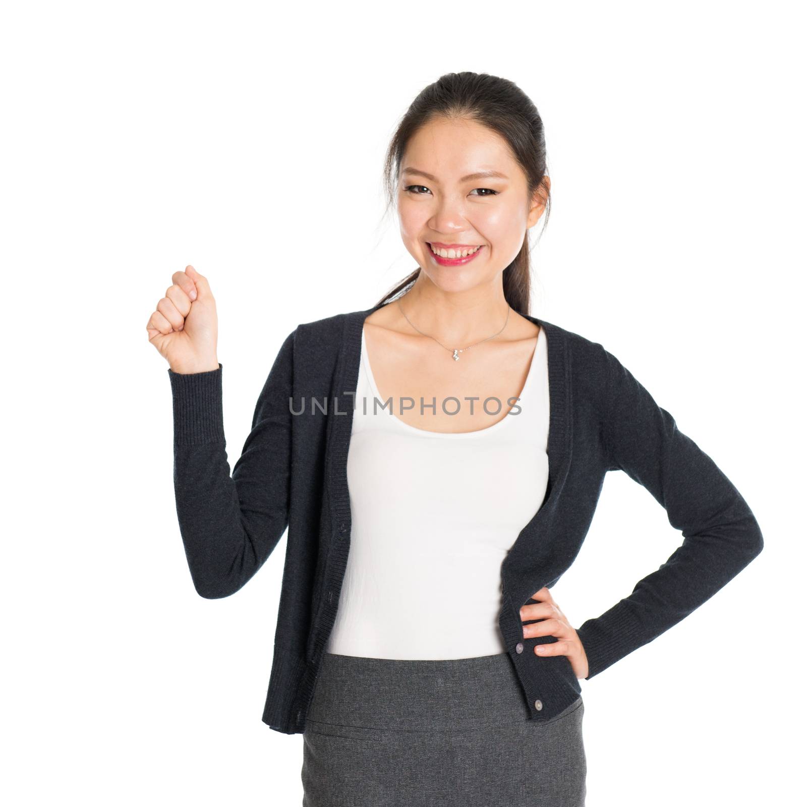 Portrait of young Asian woman hand grabbing something and smiling, isolated on white background.