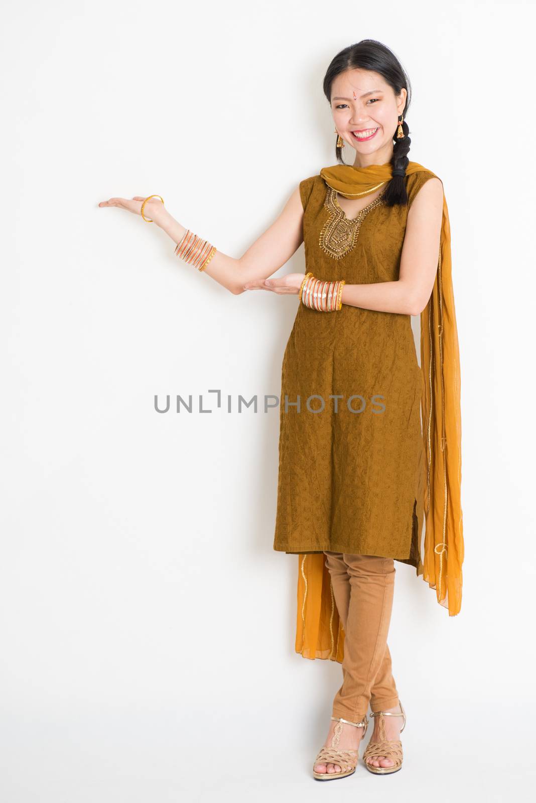 Indian Chinese woman hands showing something by szefei