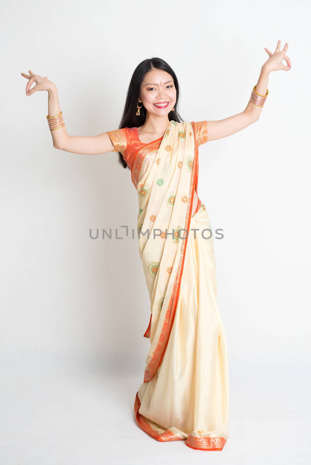 Girl in Indian sari dress dancing by szefei