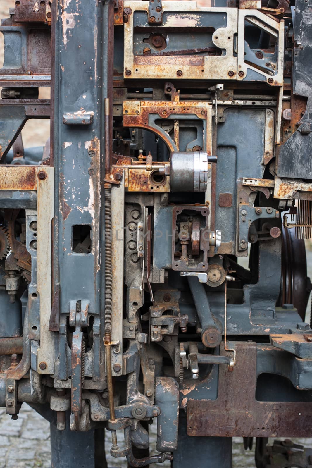 Old rusty printing machine complex mechanism of metal by Vanzyst