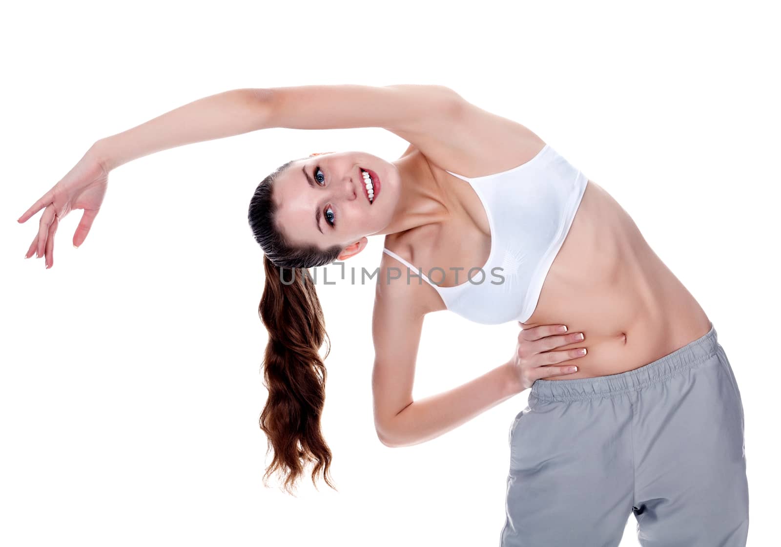 Woman doing stretching, isolated on white background by Nobilior