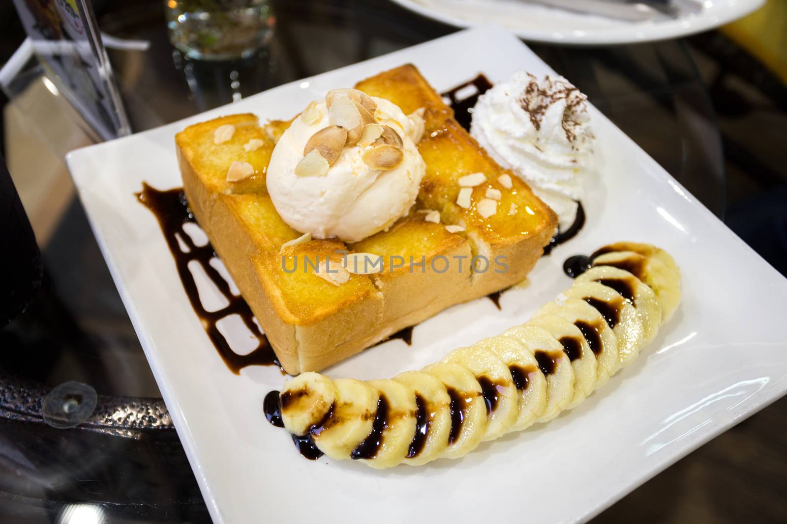 banana waffle with ice cream on top