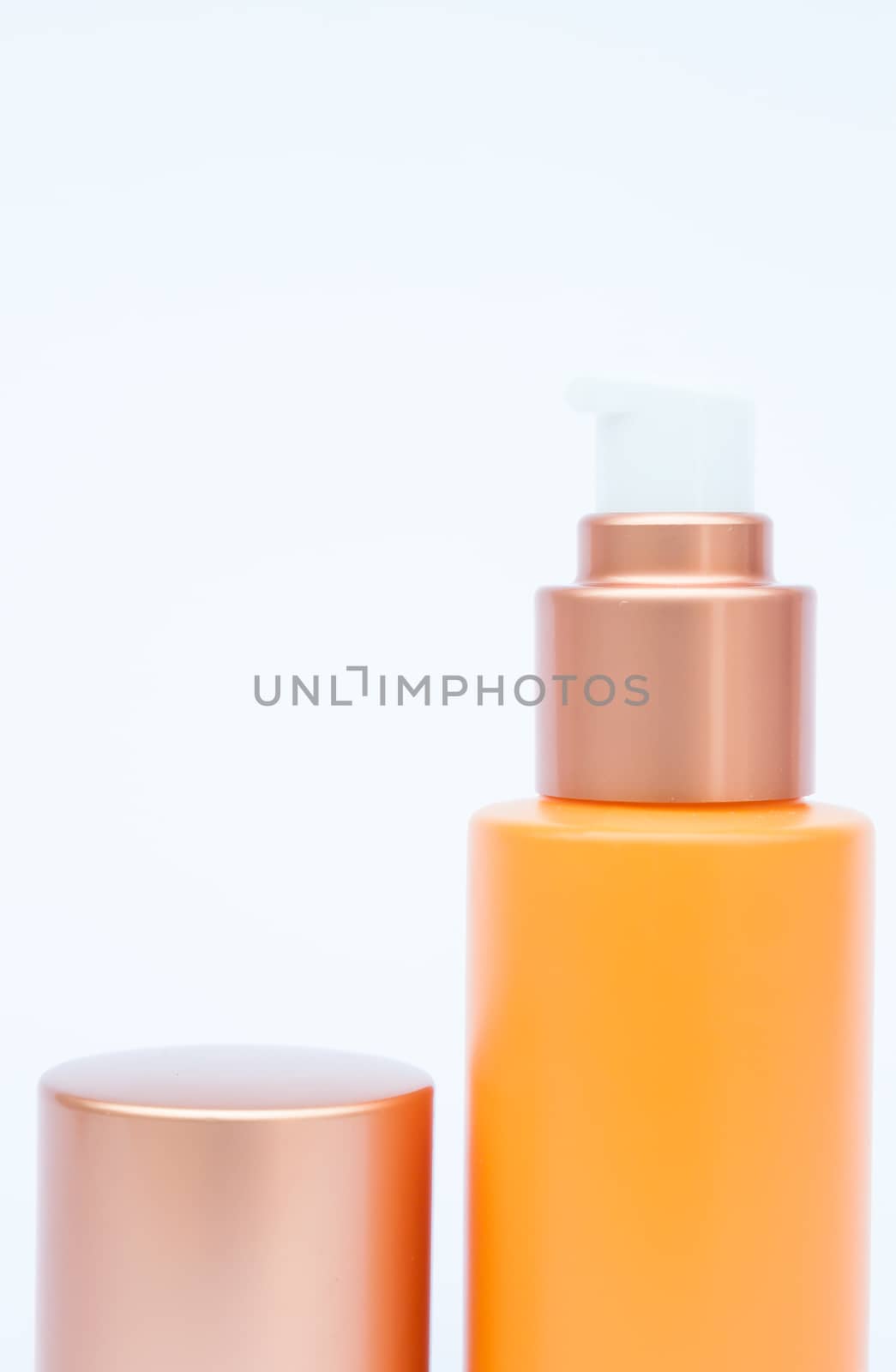 Cosmetic bottle isolated on white background by punsayaporn