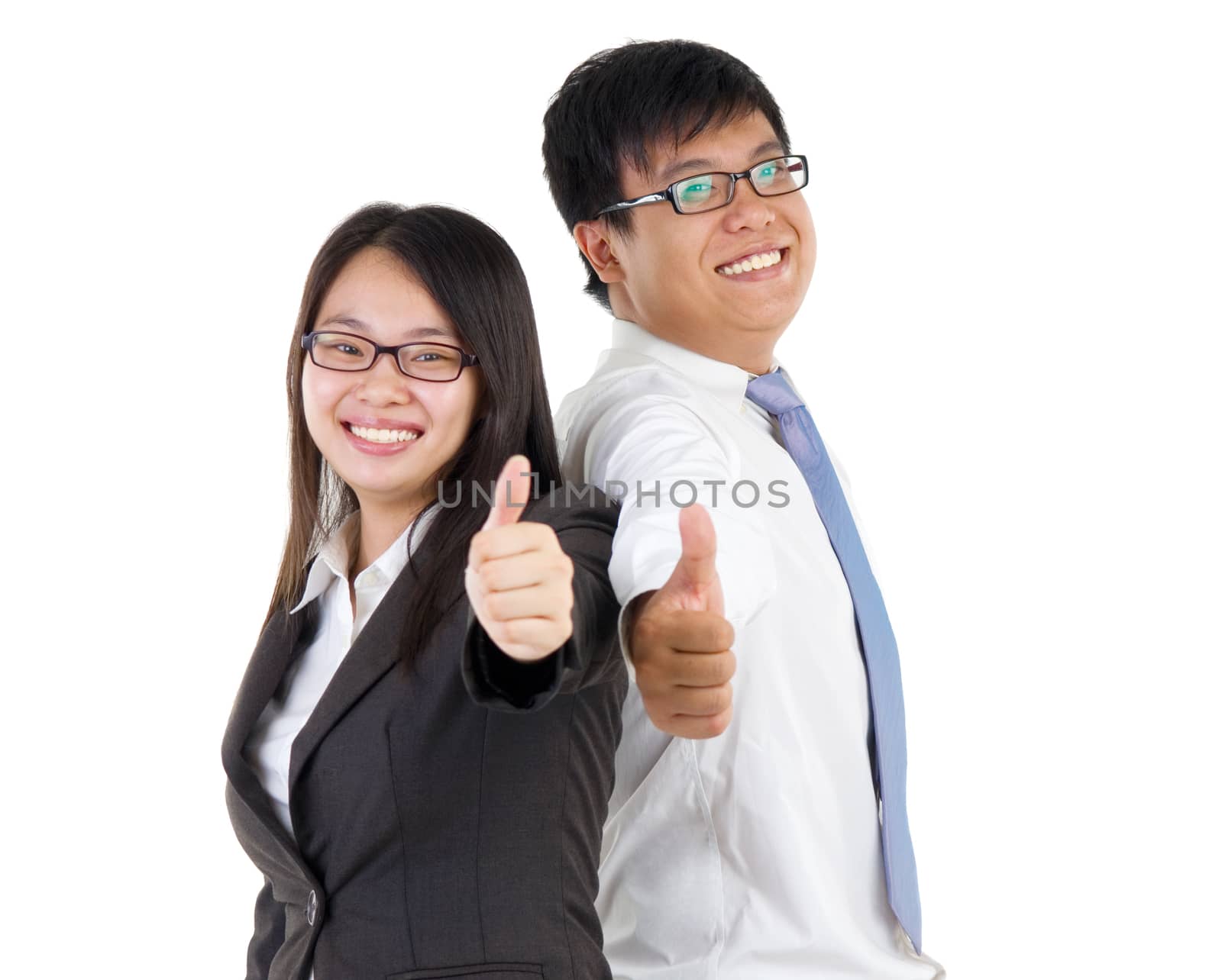 happy business man and woman with thumbs up