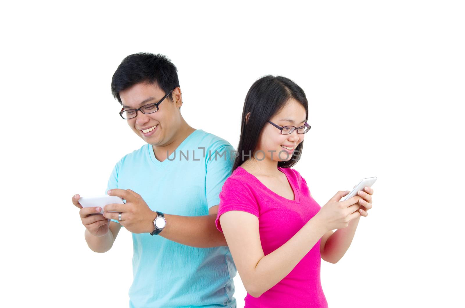 Happy young students couple with smart phone