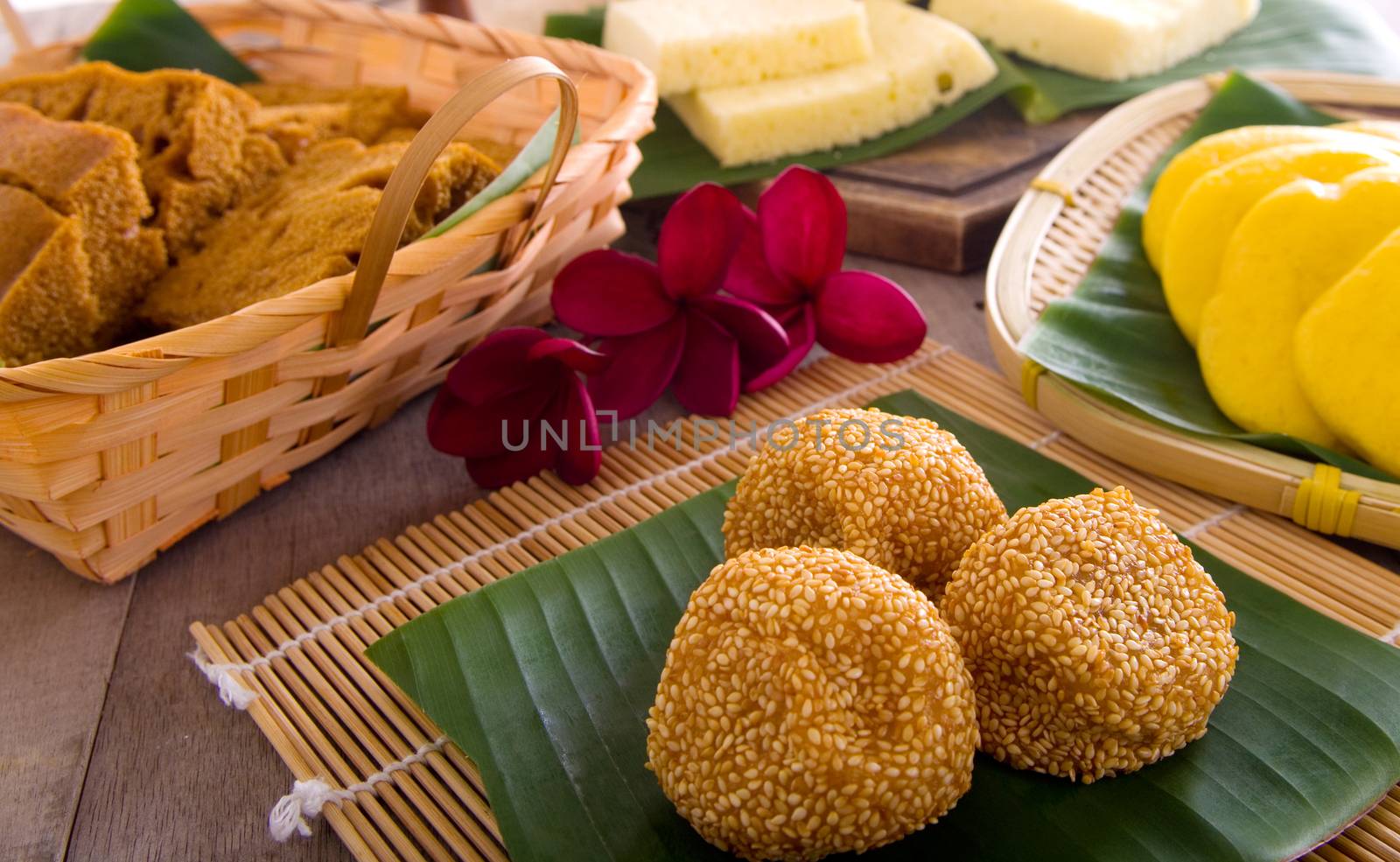 Ma Lai Gou-Traditional malaysia steamed cake.Malaysia desert ,Onde-Onde or known as Chinese Sesame Ball on banana leaf. Steam chinese cake on bamboo plate. Chinese egg cake on banana leaf.