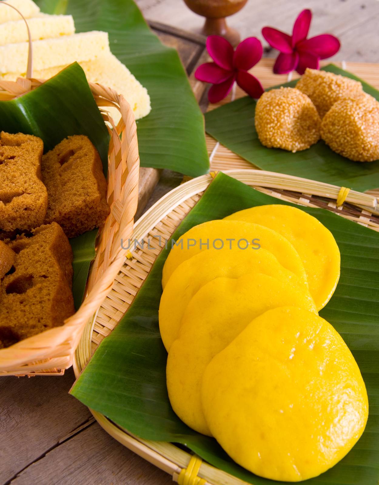 Ma Lai Gou-Traditional malaysia steamed cake.Malaysia desert ,Onde-Onde or known as Chinese Sesame Ball on banana leaf. Steam chinese cake on bamboo plate. Chinese egg cake on banana leaf.