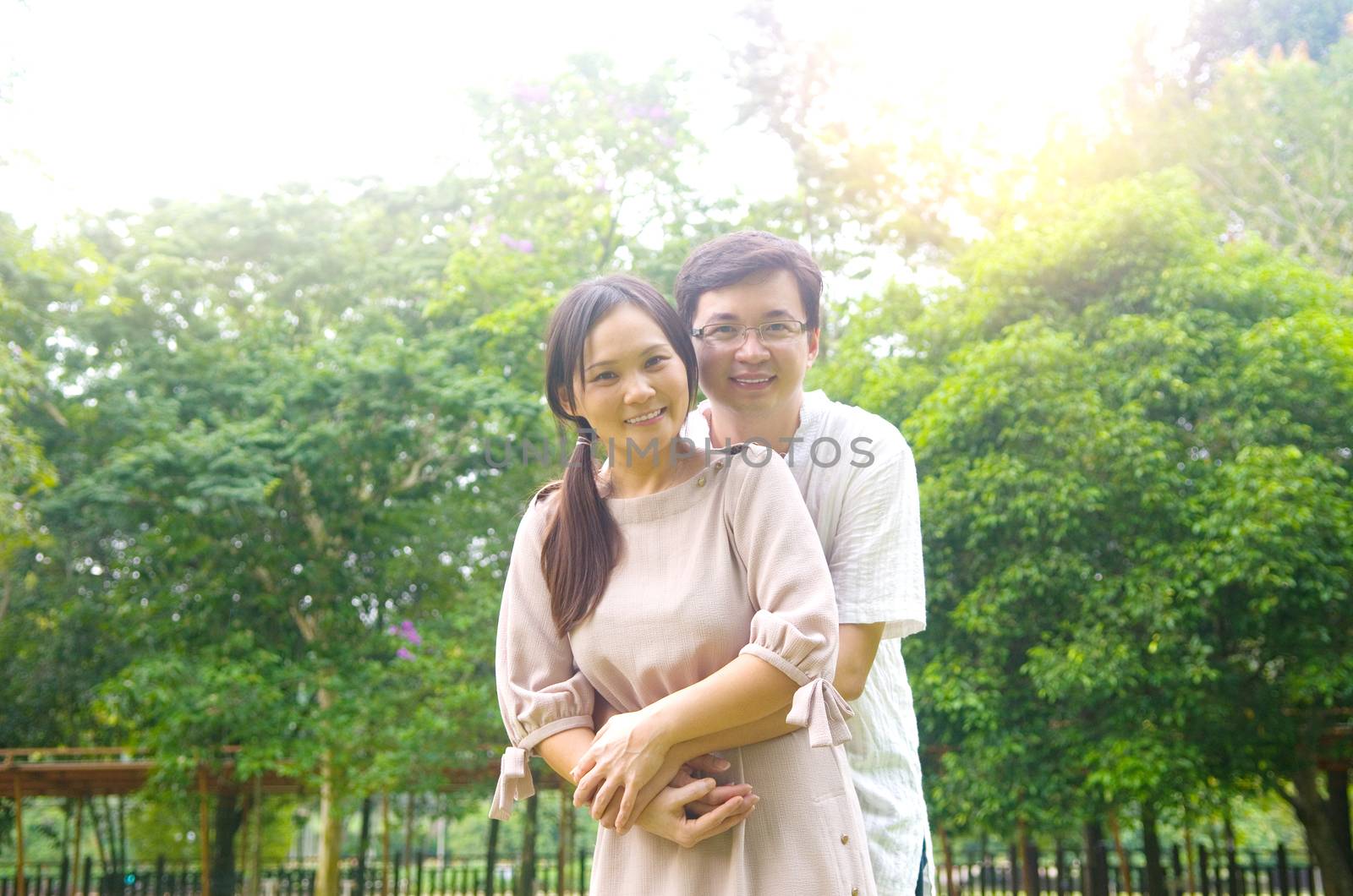 Asian romance couple in love at outdoor park.