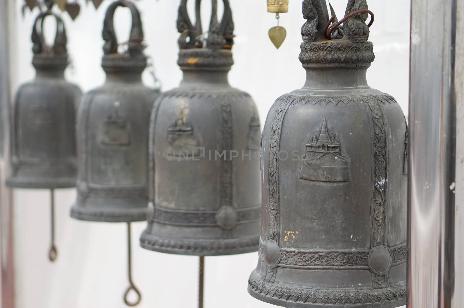 Close up bells of temple Golden Mountain Thailand by eaglesky