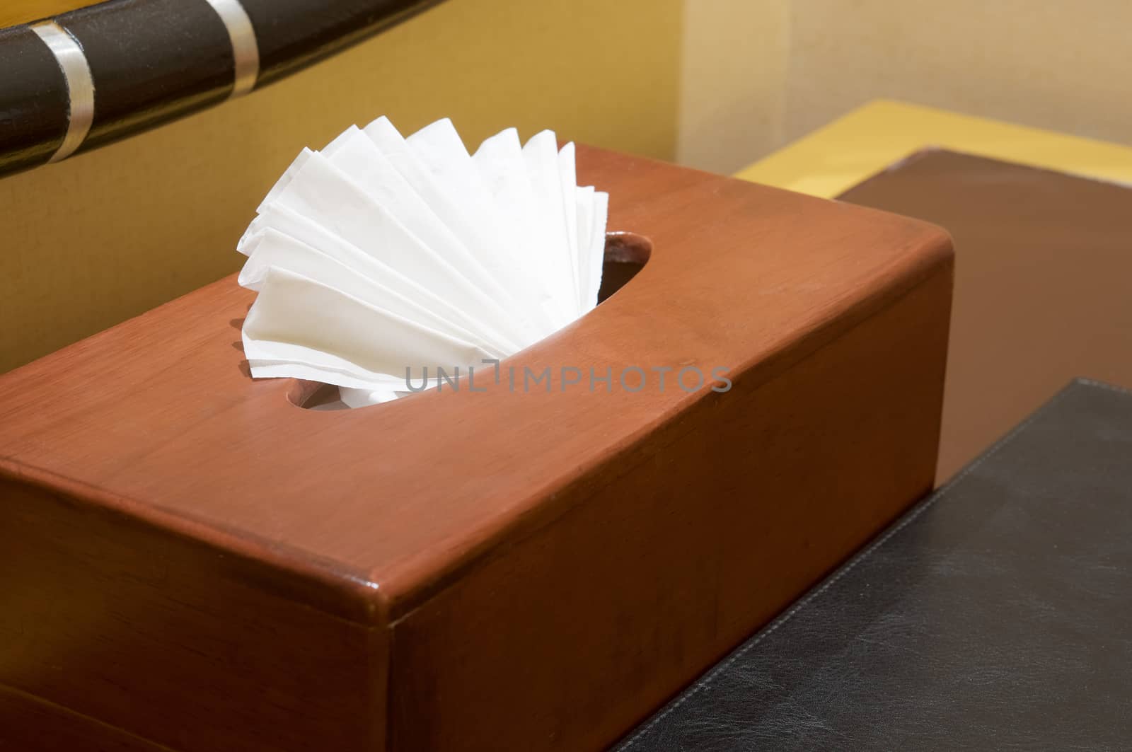 White tissue paper with wooden box on the table in vintage style.