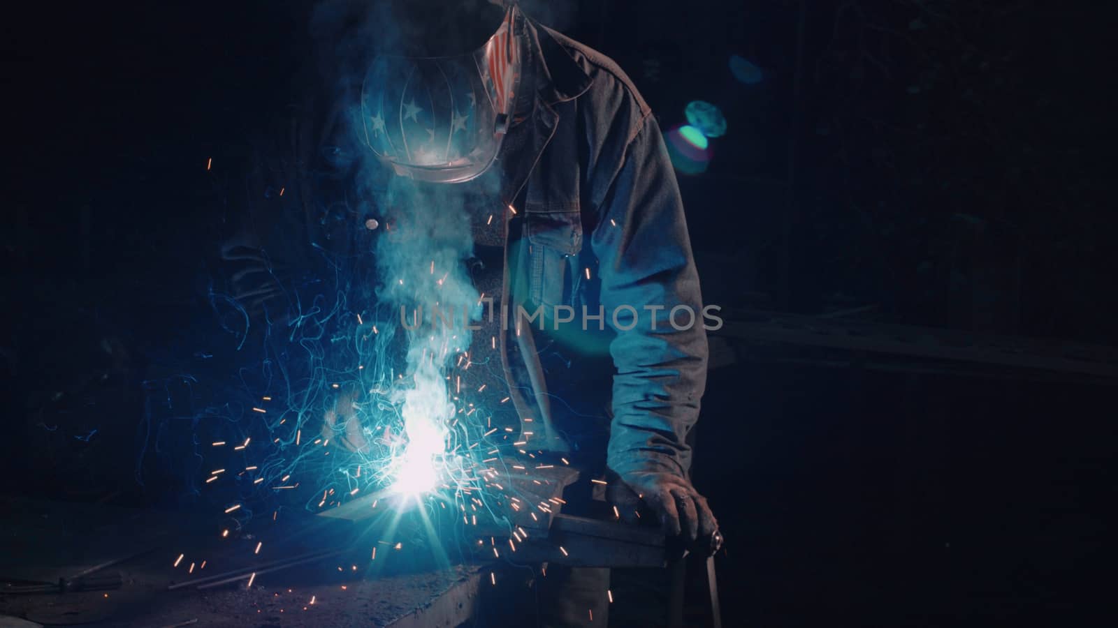 Smith welding metal details on black background