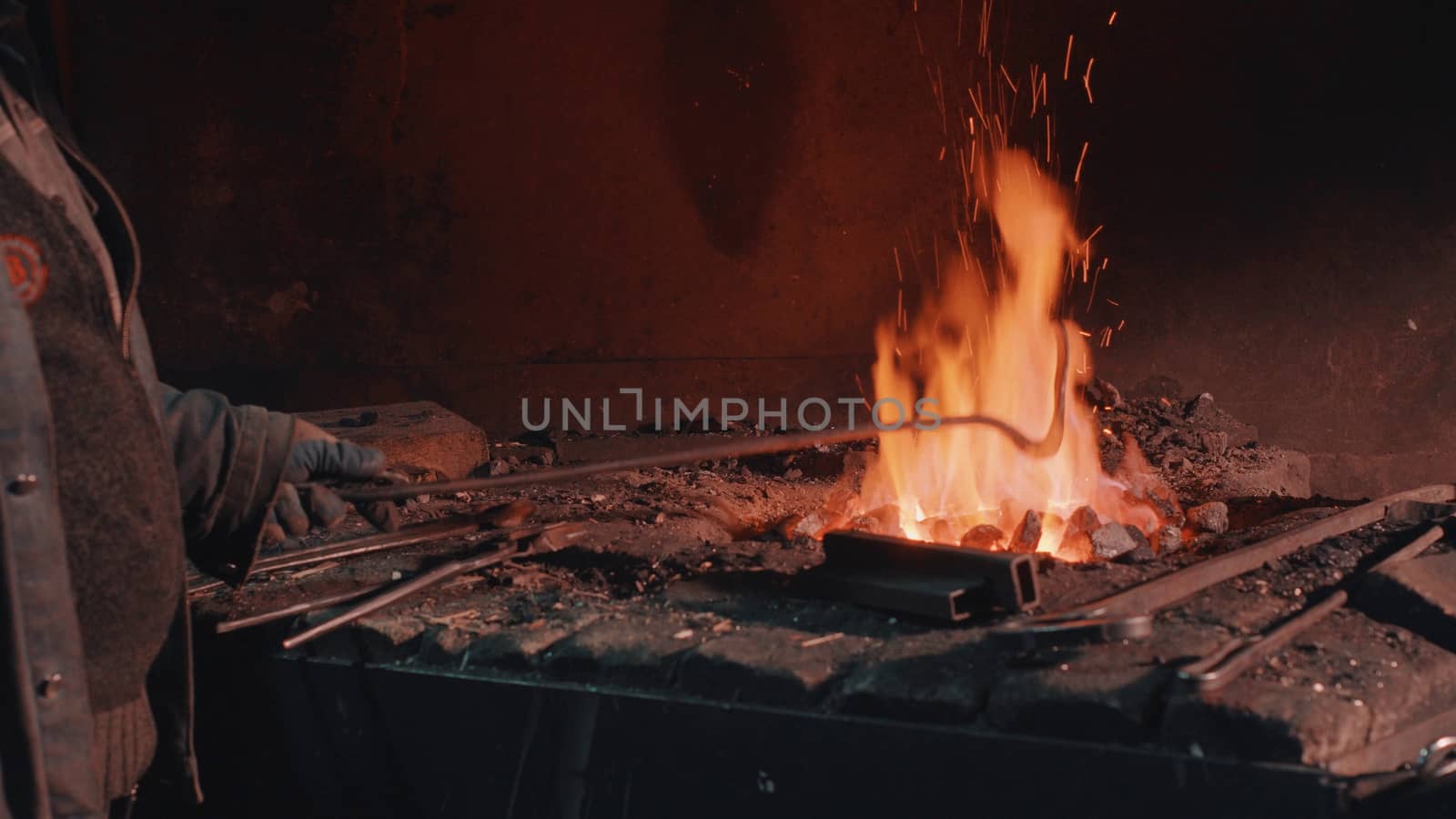 Close up of heating of metal detail in the fire