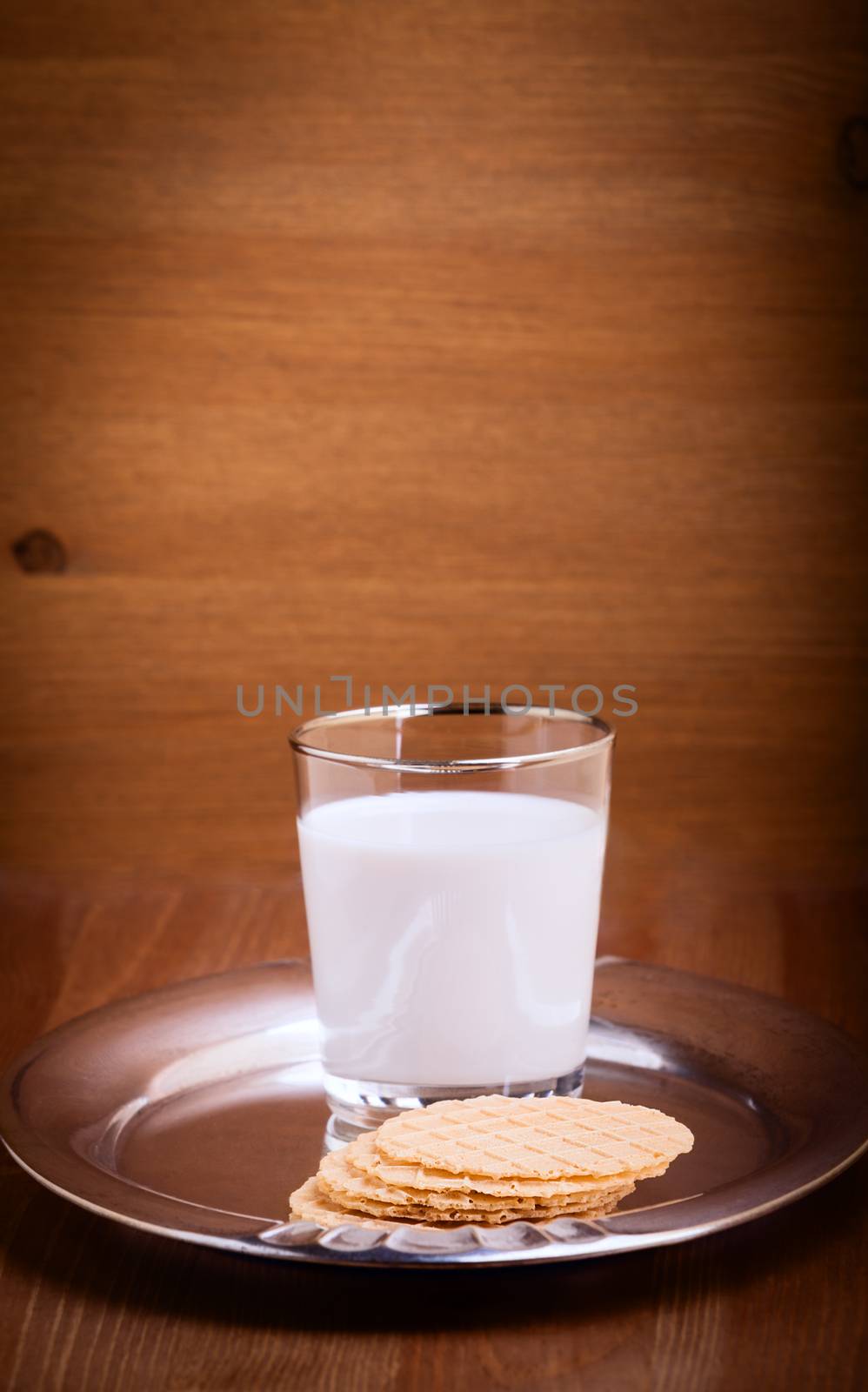 Milk and crackers served on a table