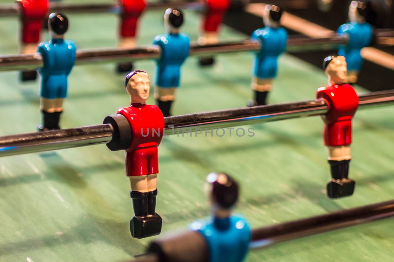 Table football game, Soccer table with red and blue players in France