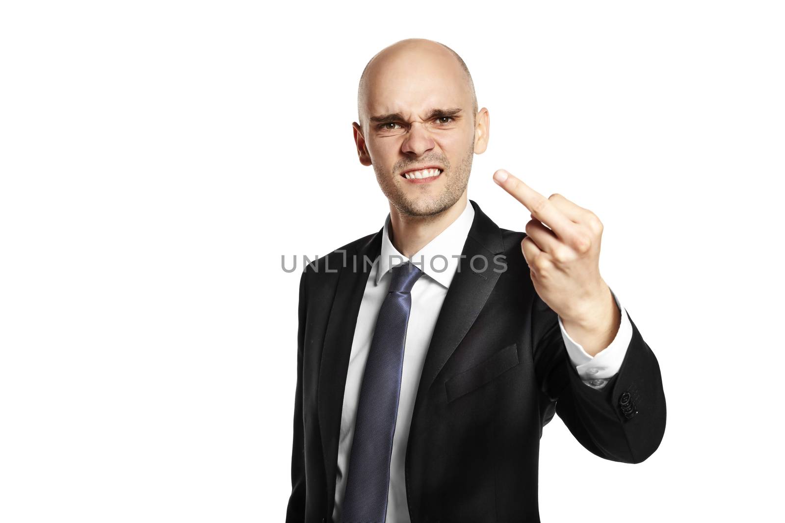 Furious young man shows fuck. Studio shot isolated on white background. 