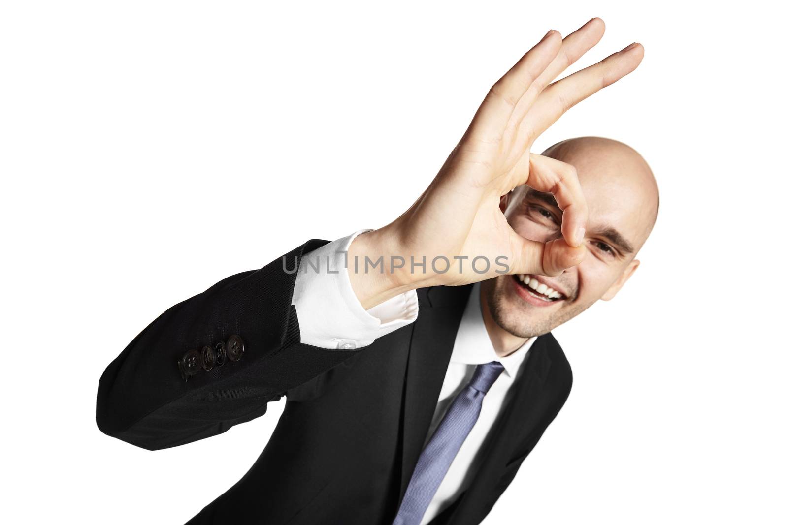 Studio shot of young happy businessman. Isolated on white background.