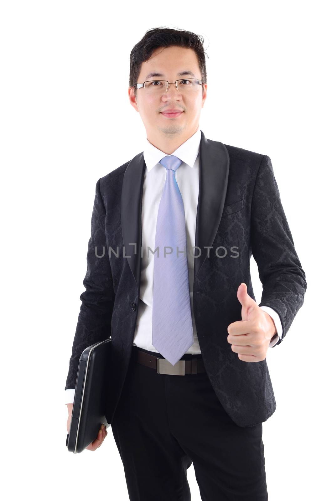 successful businessman with laptop and showing thumb up