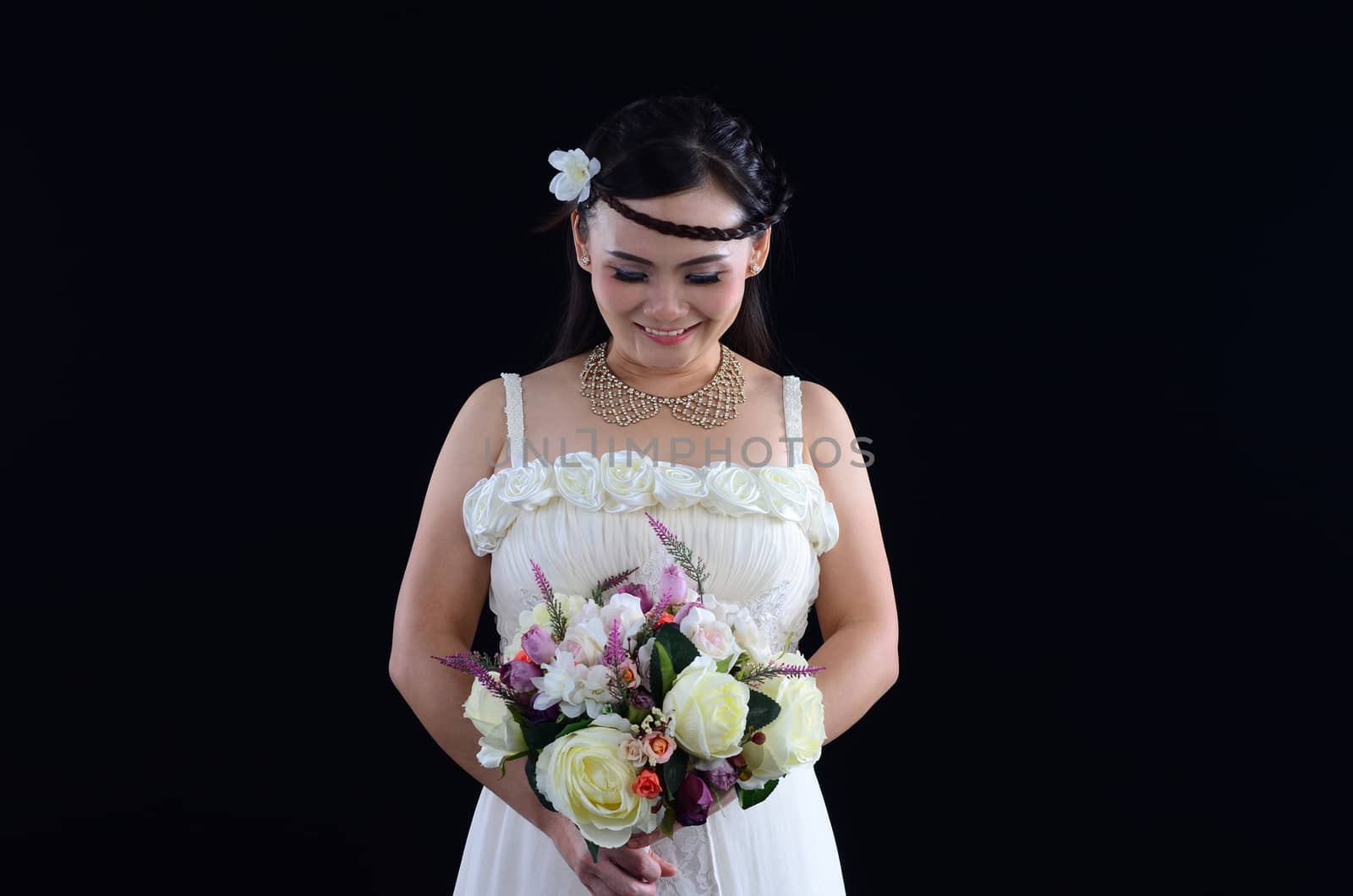 Asian bride at indoor studio