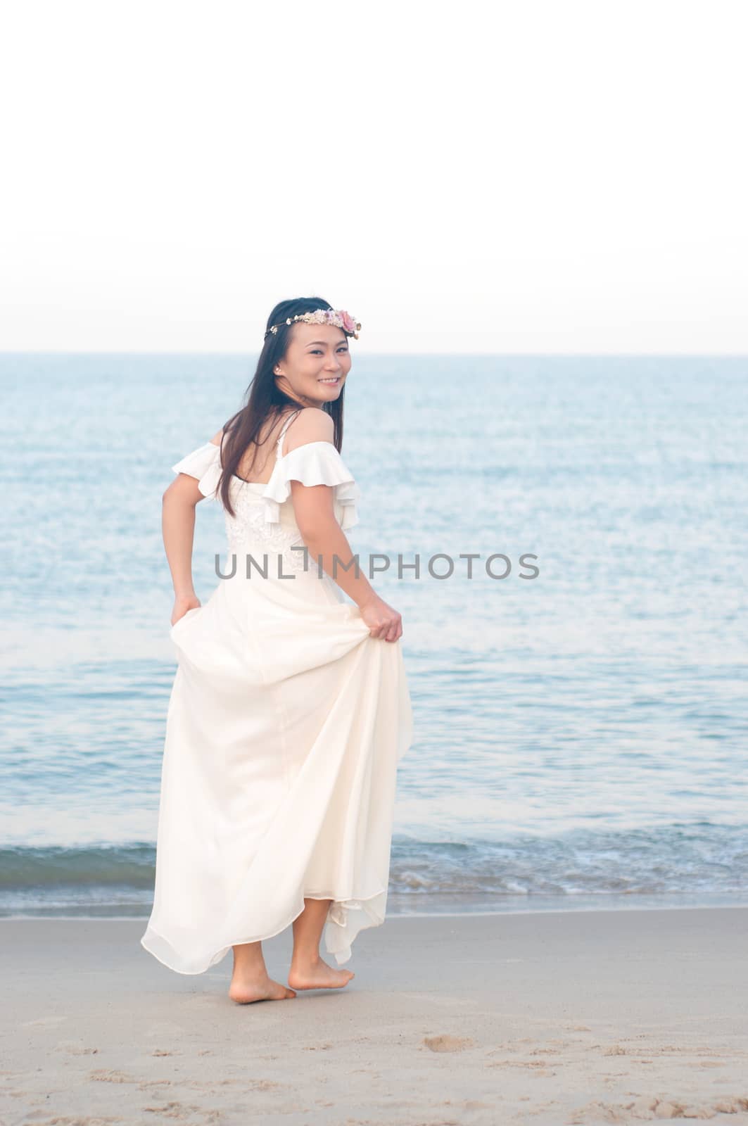 Outdoor Bride on the beach in the evening