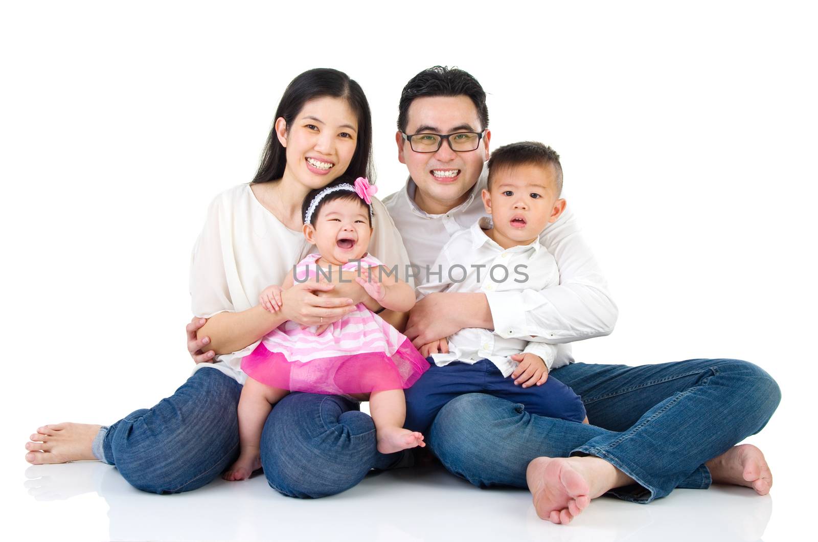 Indoor portrait of asian family