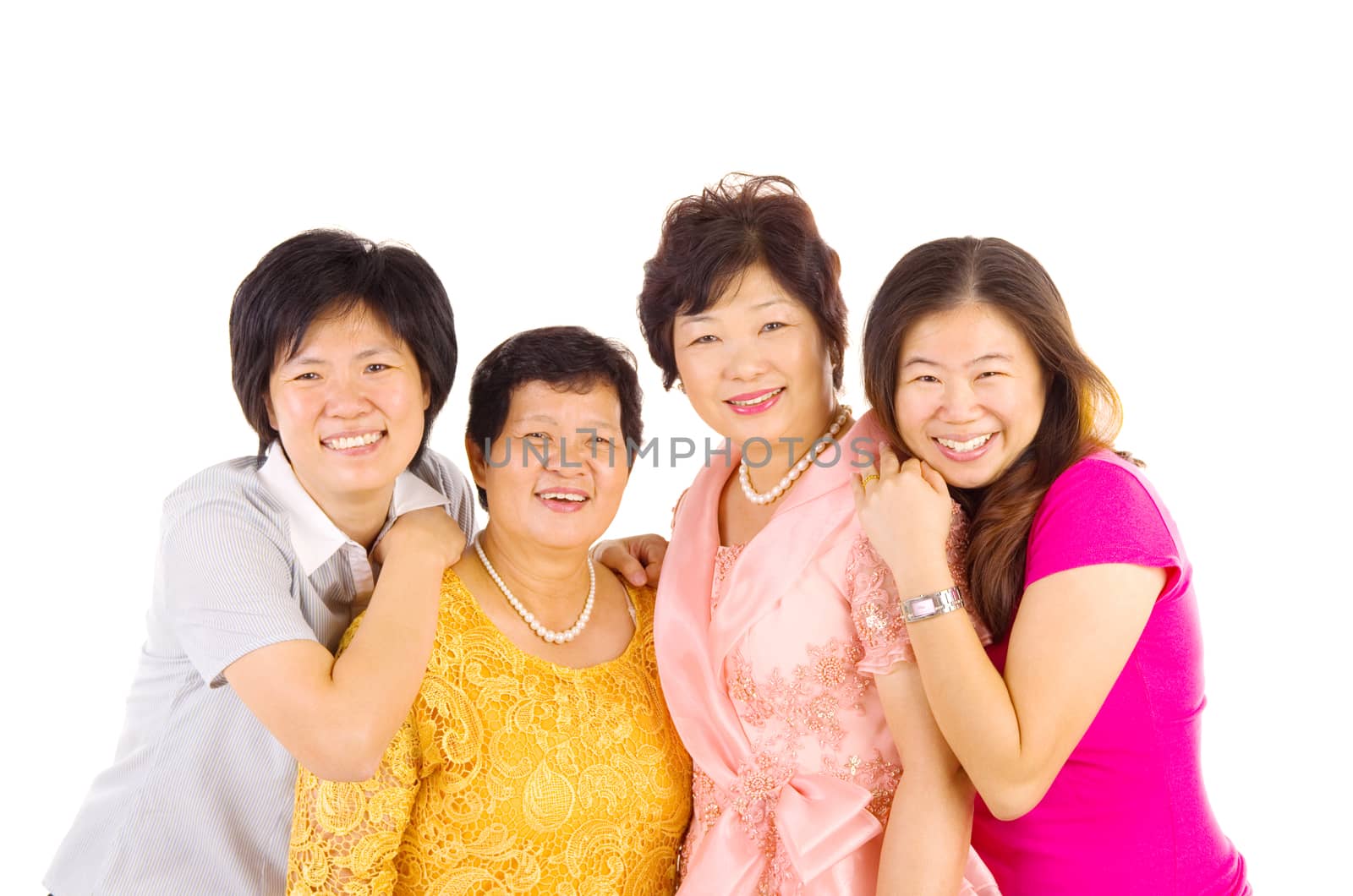 Indoor portrait of beautiful asian family over white background