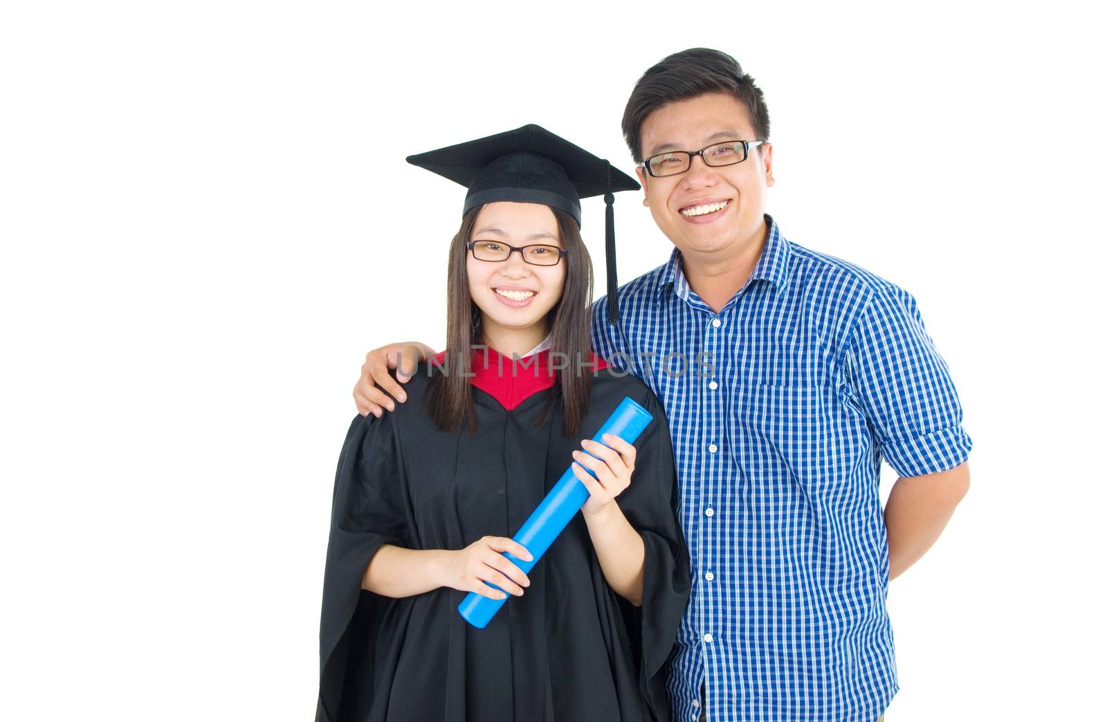 Asian university student and brother celebrating graduation