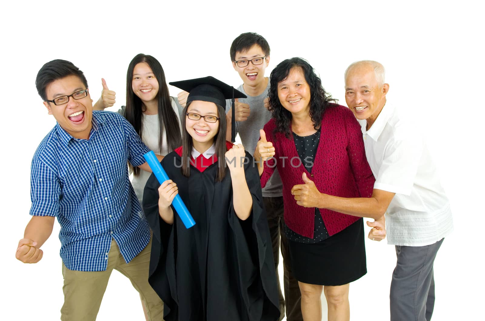 Asian family celebrate graduation for family member