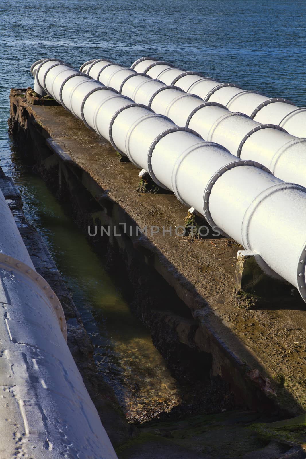 A close up of large sewage pipes