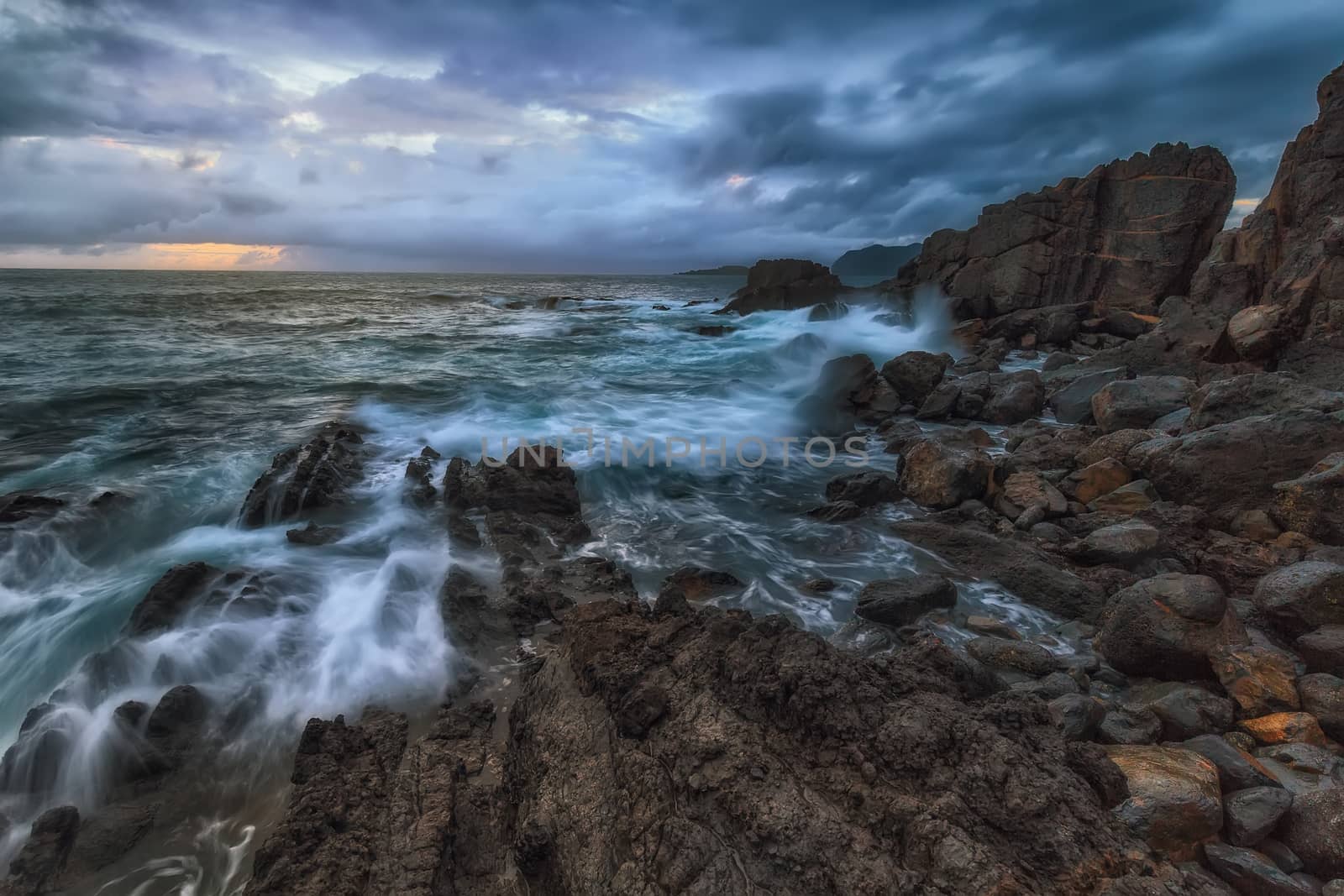 Waves and foam in the Cantabrico sea, in Bermeo