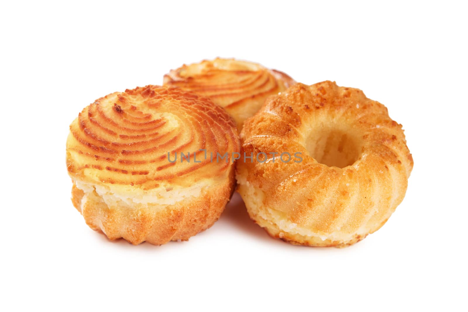 Tasty cheese muffins isolated on white background