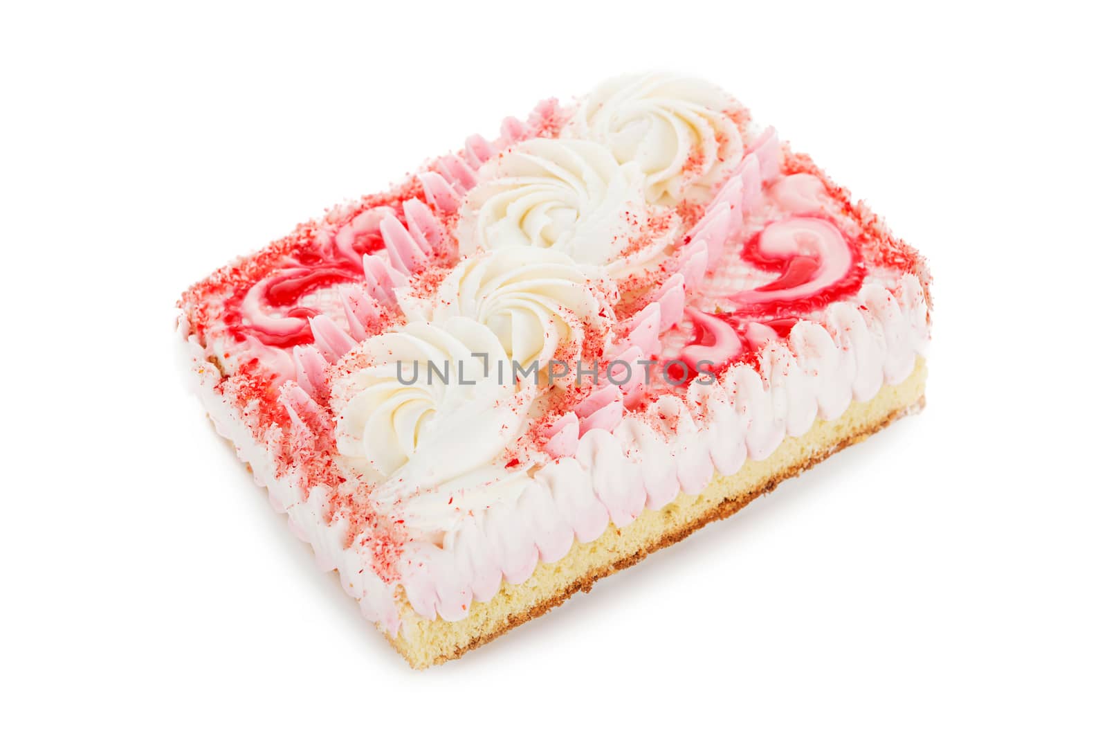 pink biscuit cake decorated with cream flowers isolated on white background