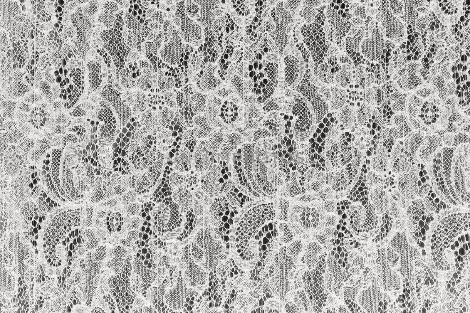 White guipure fabric with ornament. by natazhekova