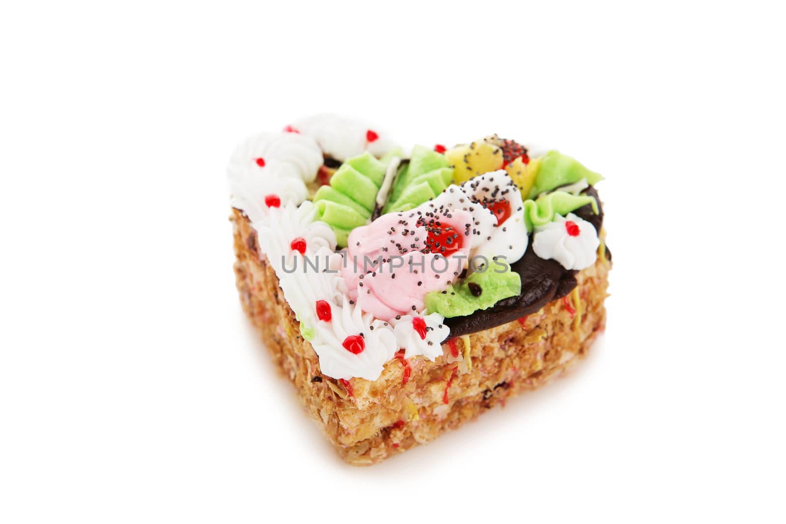 Chocolate cake in the shape of heart decorated with cream flowers isolated on white background. Confectionery, confection, pastry