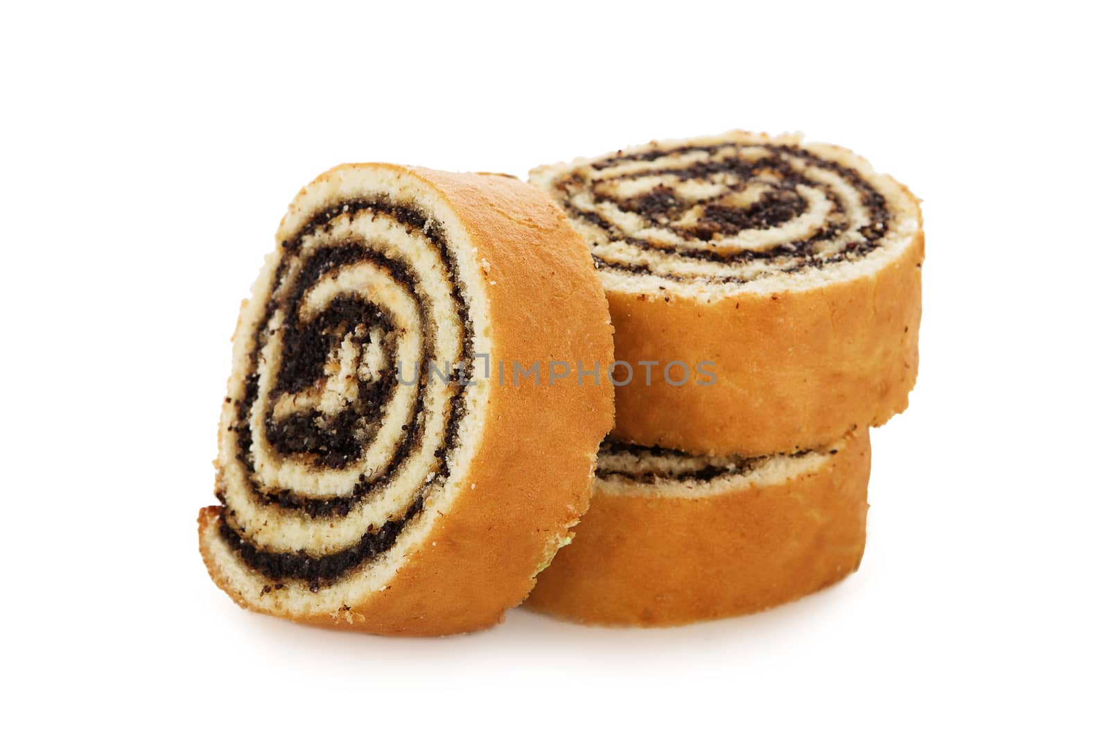 Slices of sweet roll cake with poppy seeds isolated on white background