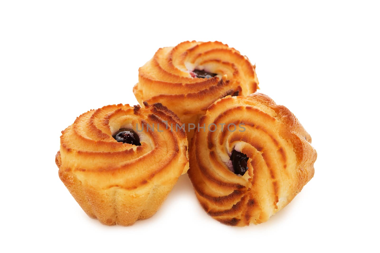 Tasty muffins with jam isolated on white by natazhekova