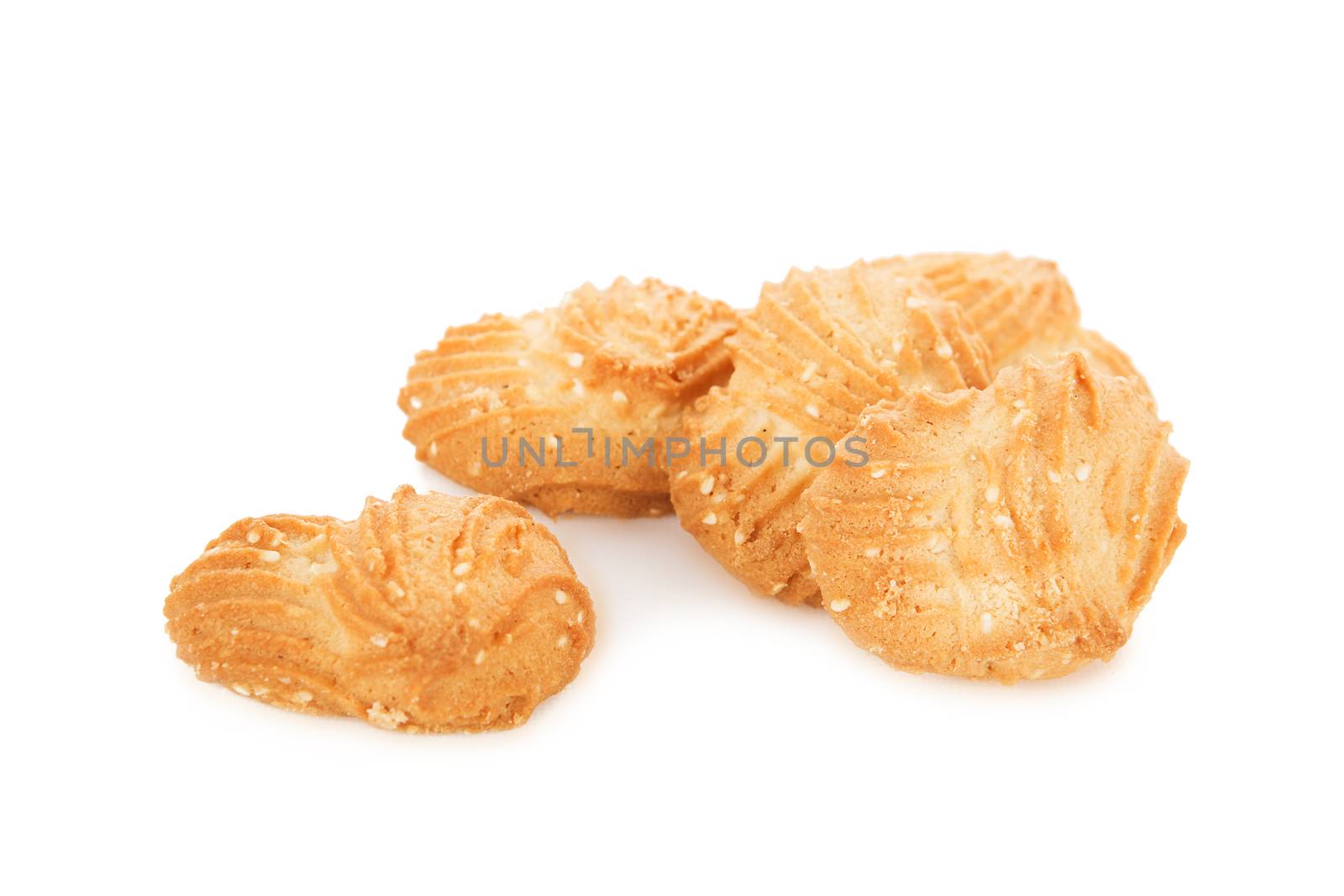 several mouthwatering shortbread cookies with sesame seeds isolated on white background