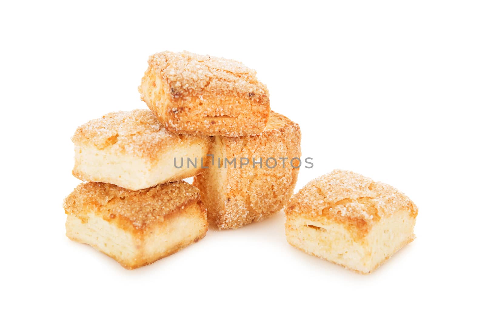 Sweet cookies in the shape of cubes isolated on white background