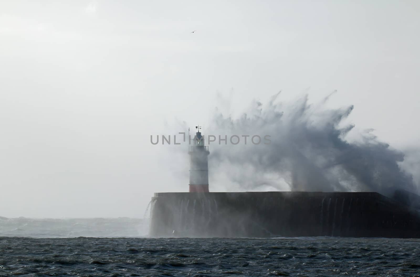 Newhaven Lighthouse in East Sussex, England, during Storm Doris in February 2017