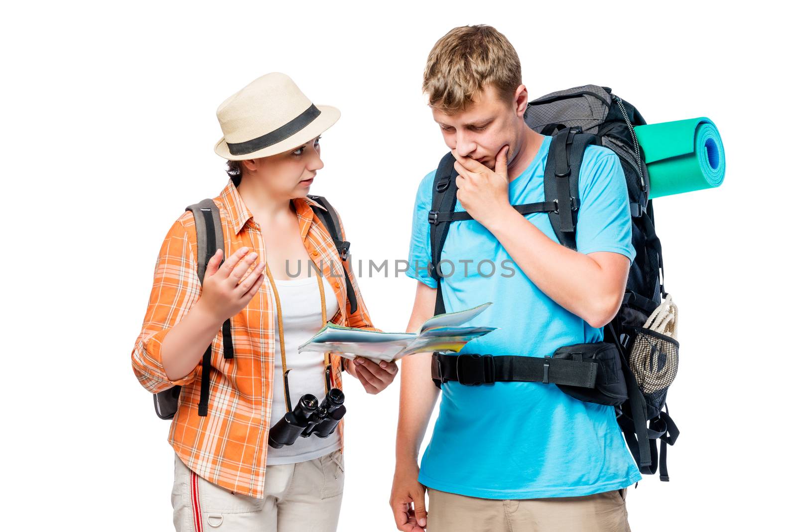 Bustling tourists think and discuss the route with a map in hand