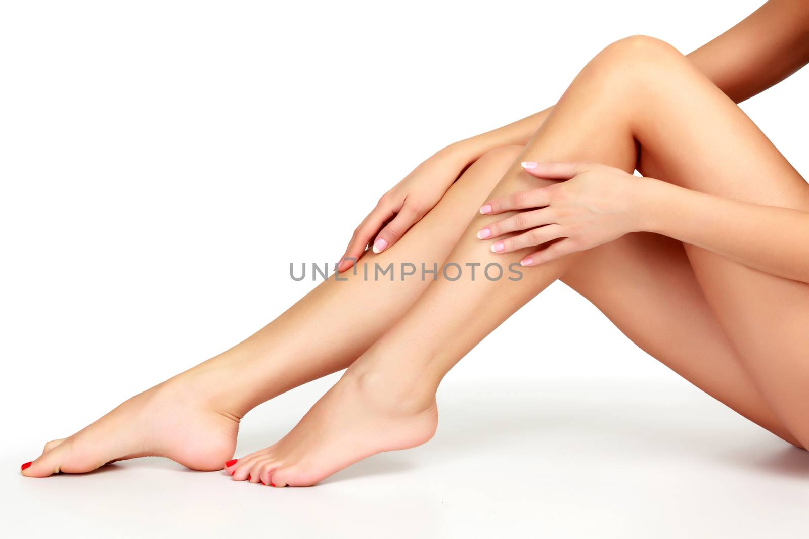 Woman legs on white background, isolated by Nobilior