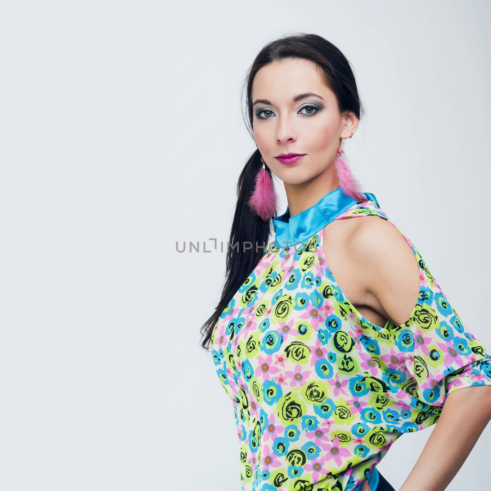 attractive beautiful fashion girl in colorful clothes