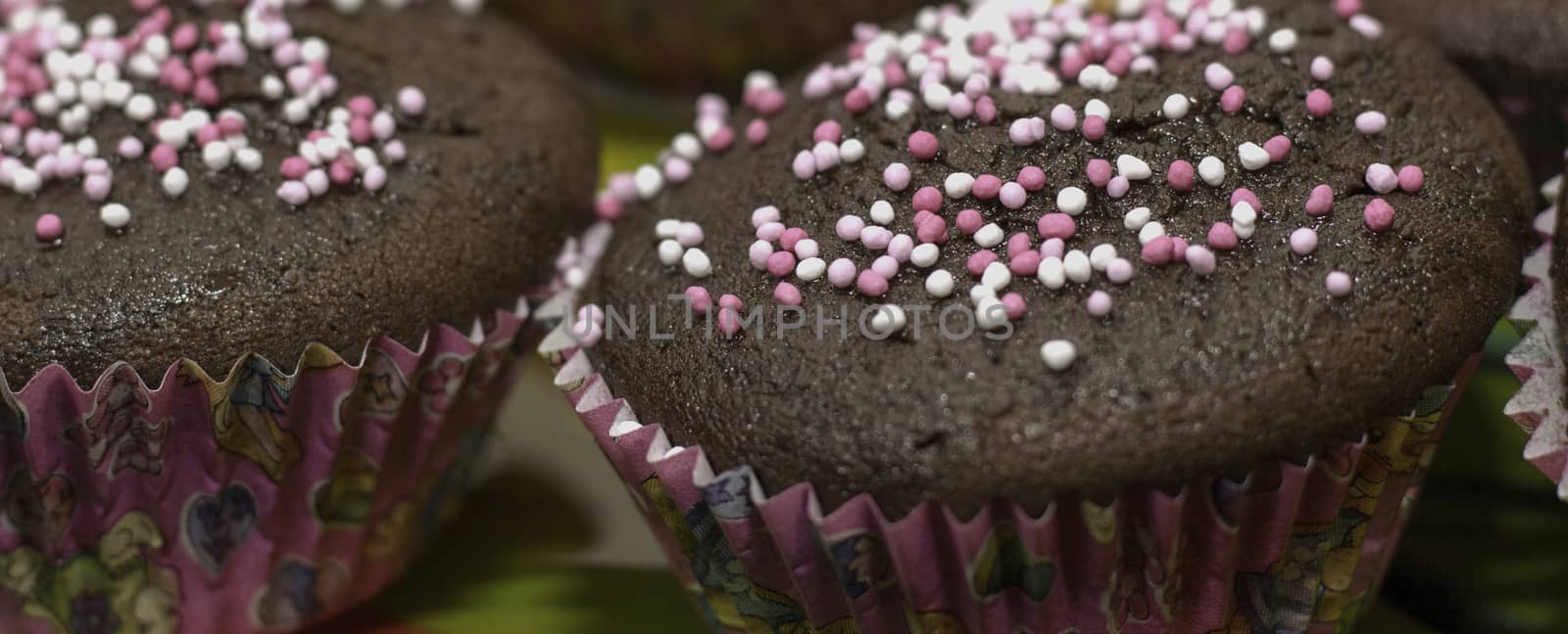 Muffins In Pink Forms For Baking . by gstalker