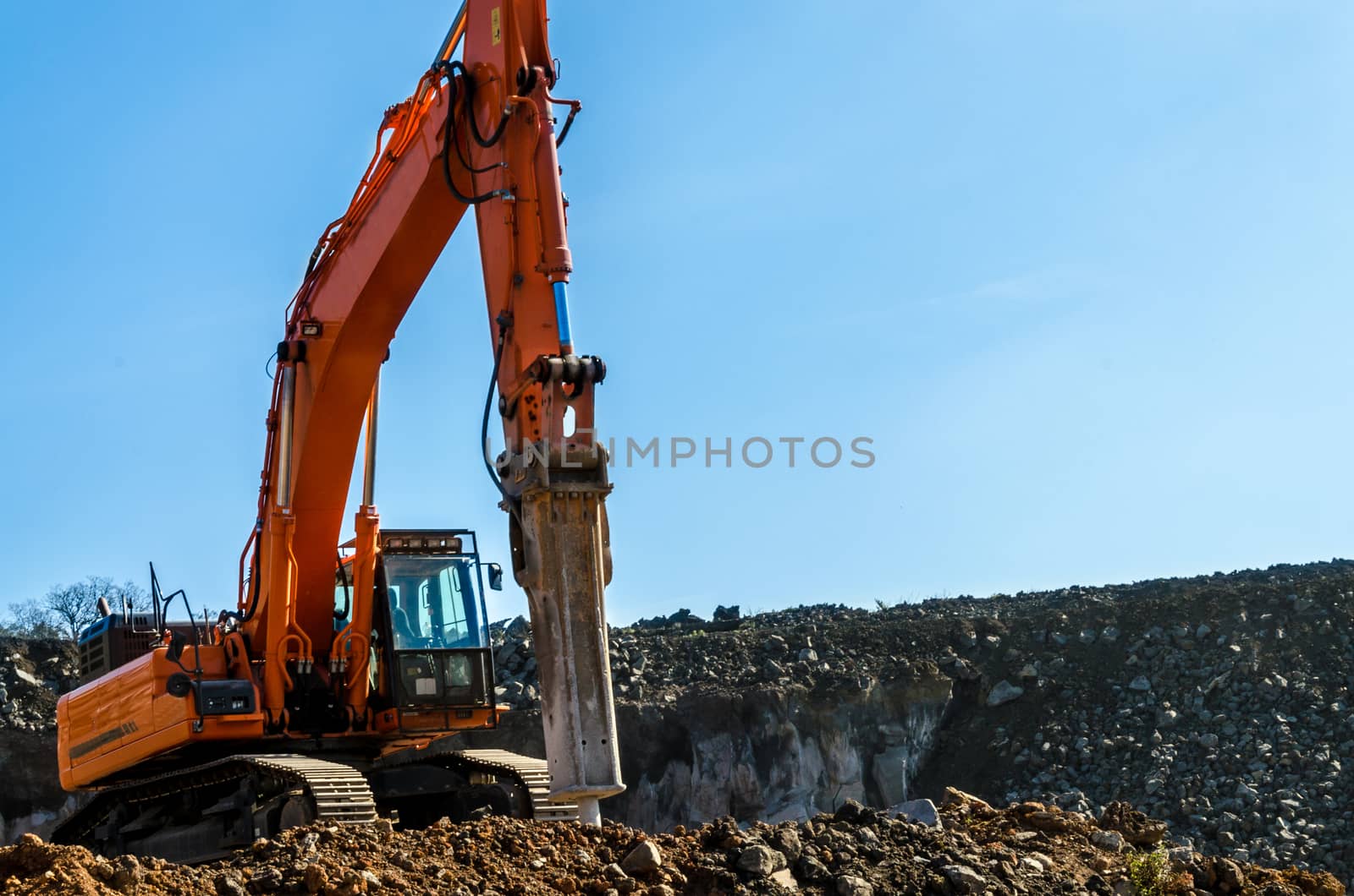 the excavator in a mine in a day's work